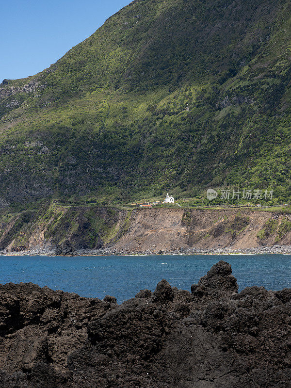 The church of Nossa Senhora do Carmo is just a white spot in this amazing view of Ponta da Fajã.